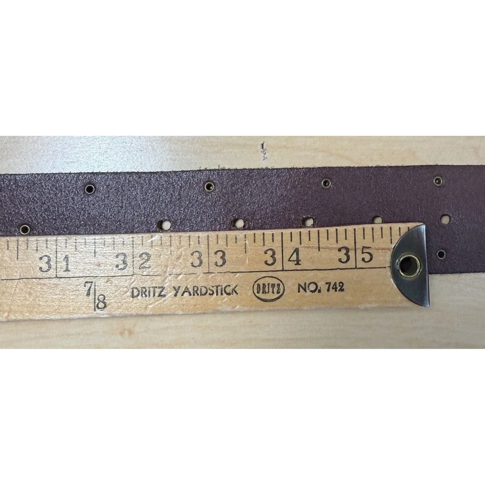 Fossil leather belt
